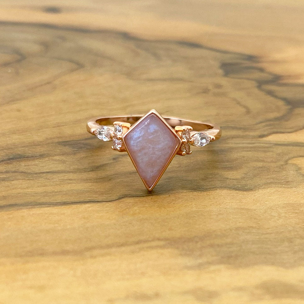 Kite shaped 'diamond' ring with marquise accents